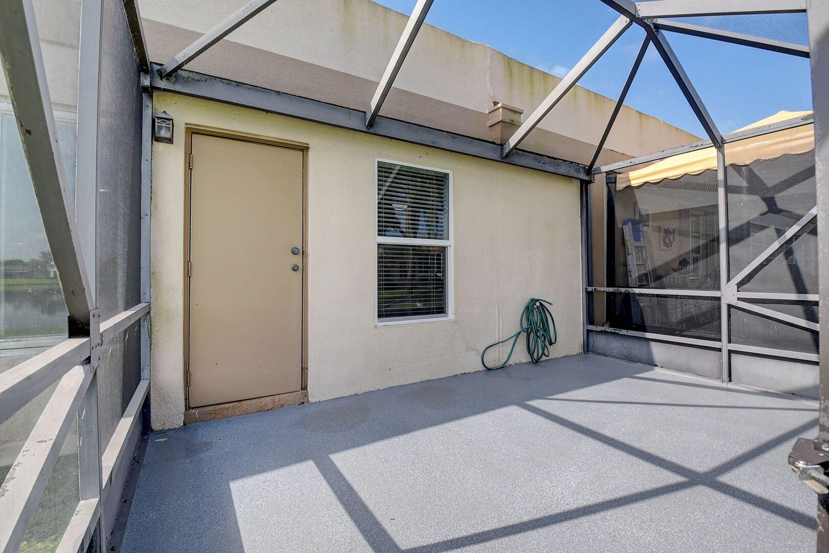 9111 Tracy Court, Unit 4 Boca Raton, FL 33496 - Photo 23 of 47 Back Patio