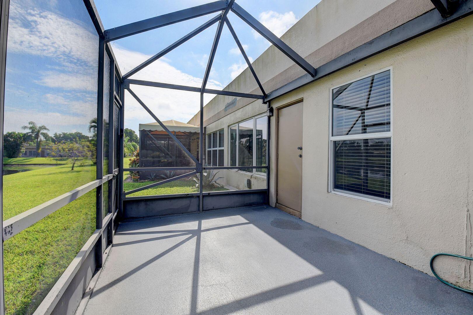 9111 Tracy Court, Unit 4 Boca Raton, FL 33496 - Photo 24 of 47 Back Patio
