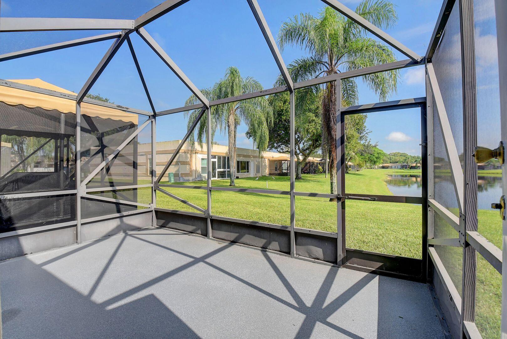 9111 Tracy Court, Unit 4 Boca Raton, FL 33496 - Photo 25 of 47 Back Patio