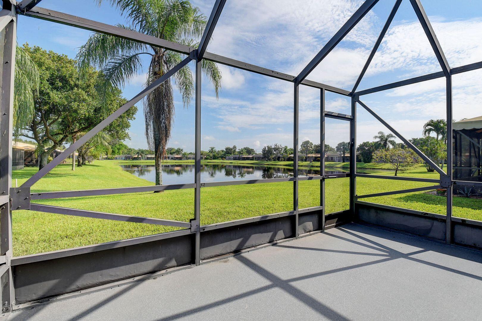 9111 Tracy Court, Unit 4 Boca Raton, FL 33496 - Photo 26 of 47 Back Patio