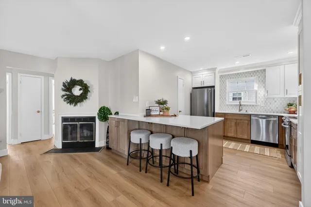 a kitchen with a table and chairs in it