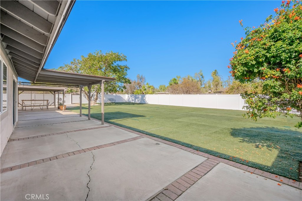 16810 Tava Lane Riverside, CA 92504 - Photo 24 of 33 a view of a backyard with an outdoor space