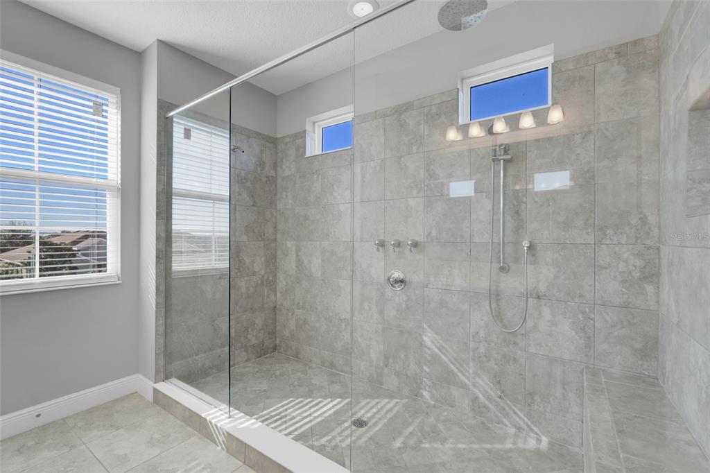 959 Maypole Drive Apopka, FL 32703 - Photo 25 of 44 a bathroom with a shower