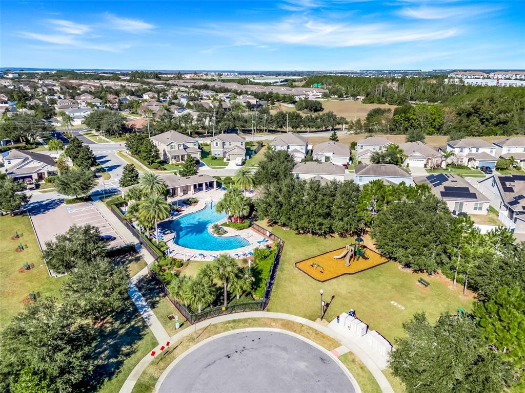 959 Maypole Drive Apopka, FL 32703 - Photo 40 of 44 an aerial view of residential houses with outdoor space