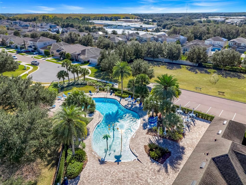 959 Maypole Drive Apopka, FL 32703 - Photo 41 of 44 an aerial view of a house with a swimming pool