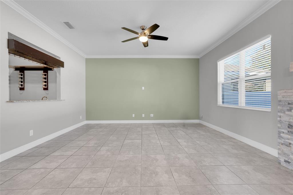 959 Maypole Drive Apopka, FL 32703 - Photo 10 of 44 a view of an empty room with a window