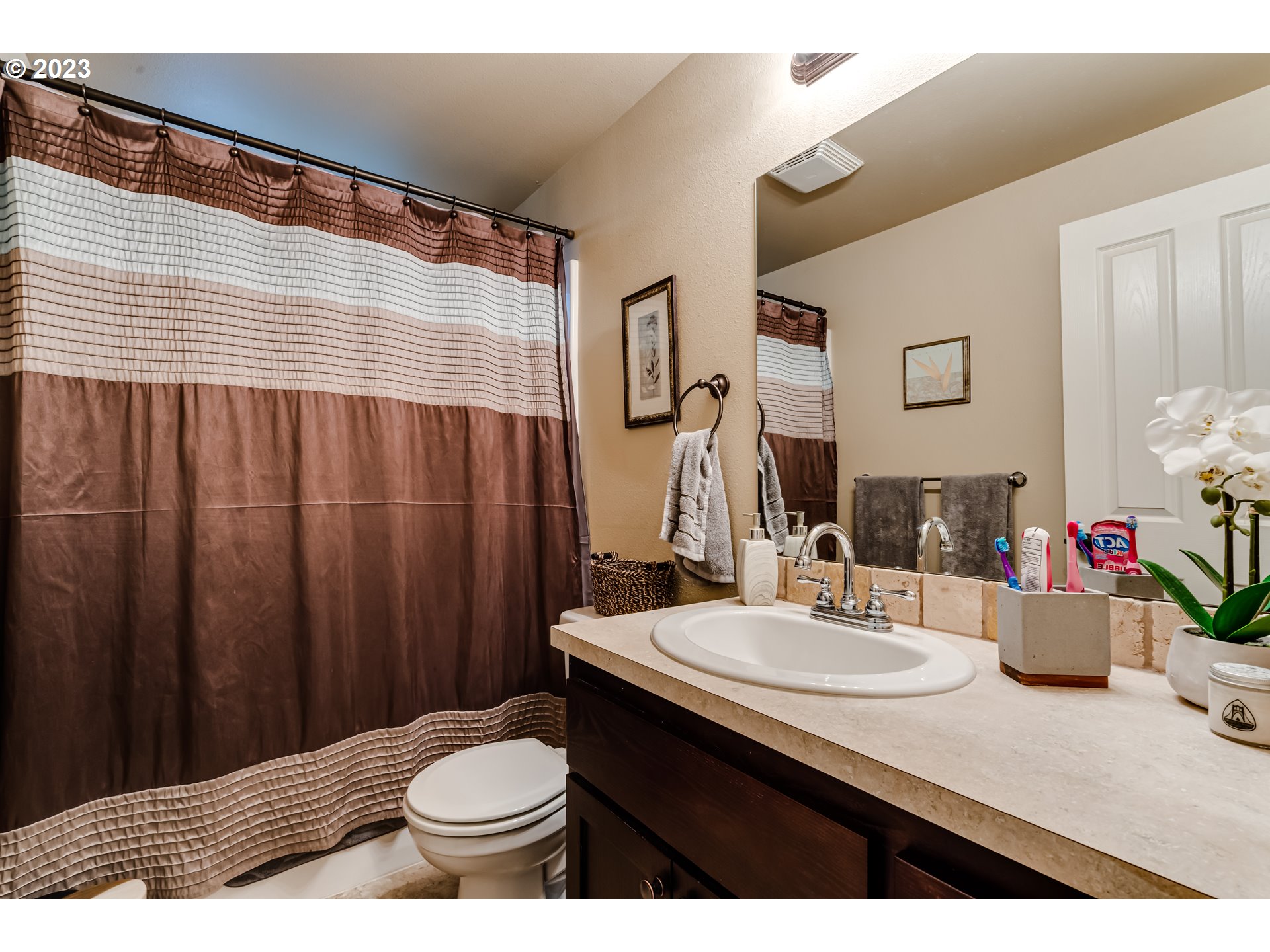 440 22nd Street Springfield, OR 97477 - Photo 22 of 31 a bathroom with a sink and a mirror