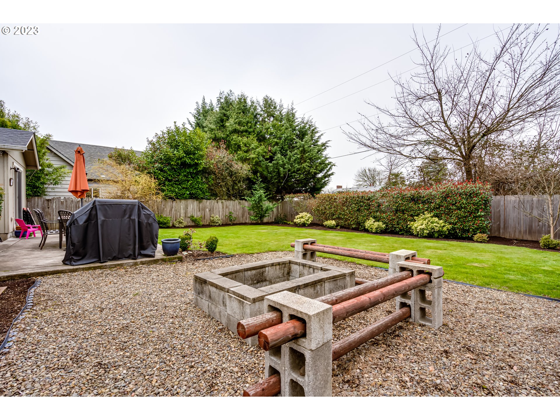 440 22nd Street Springfield, OR 97477 - Photo 27 of 31 a backyard of a house with outdoor seating