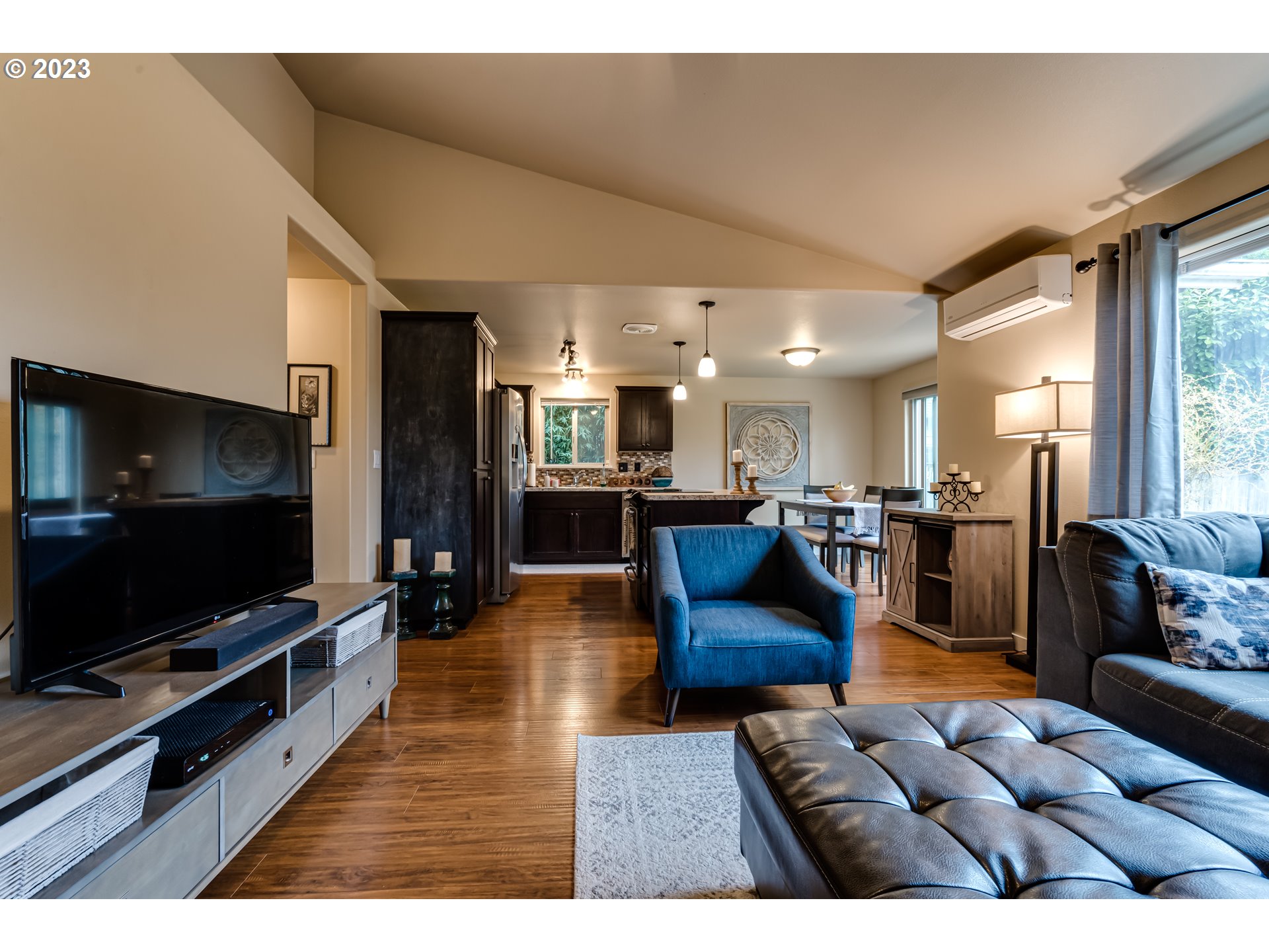 440 22nd Street Springfield, OR 97477 - Photo 6 of 31 a living room with furniture and a flat screen tv