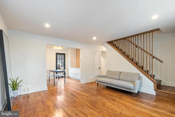 a view of livingroom with furniture and wooden floor