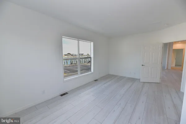 a bathroom with a double vanity sink and mirror