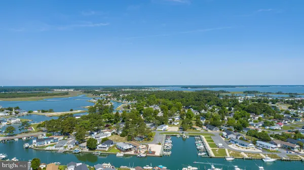 a view of a city with lawn chairs