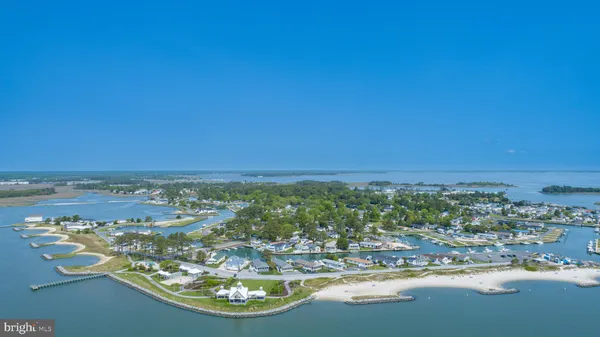 a view of a balcony with wooden floor