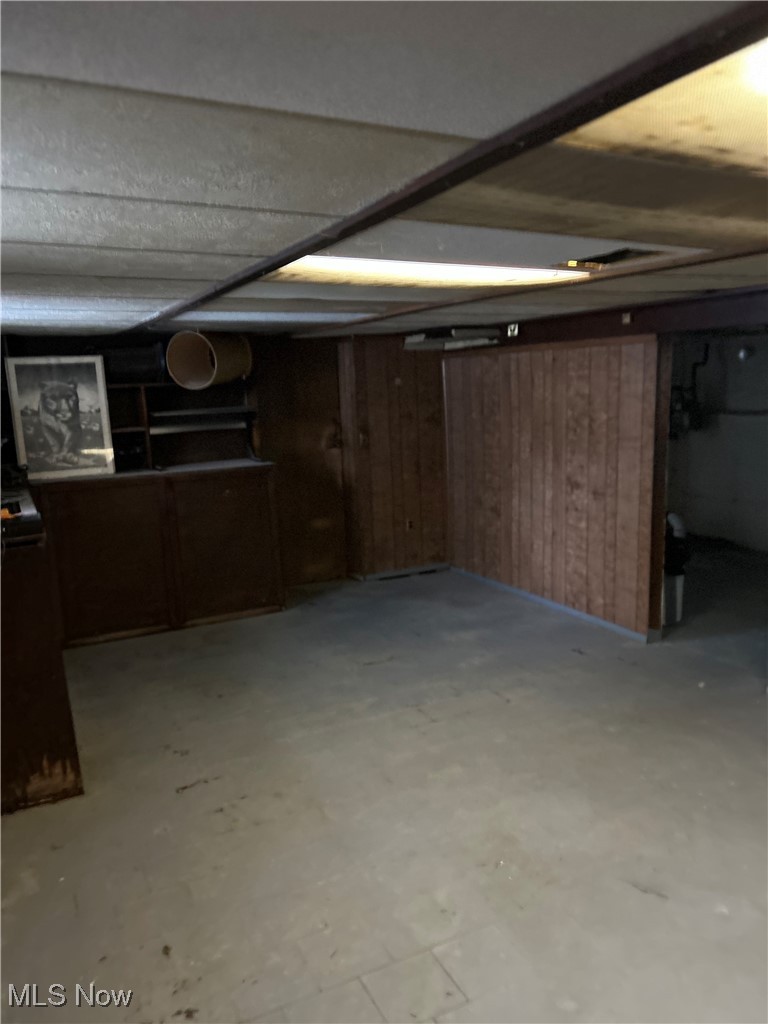 11406 Bellaire Road Cleveland, OH 44111 - Photo 19 of 28 Basement featuring wood walls