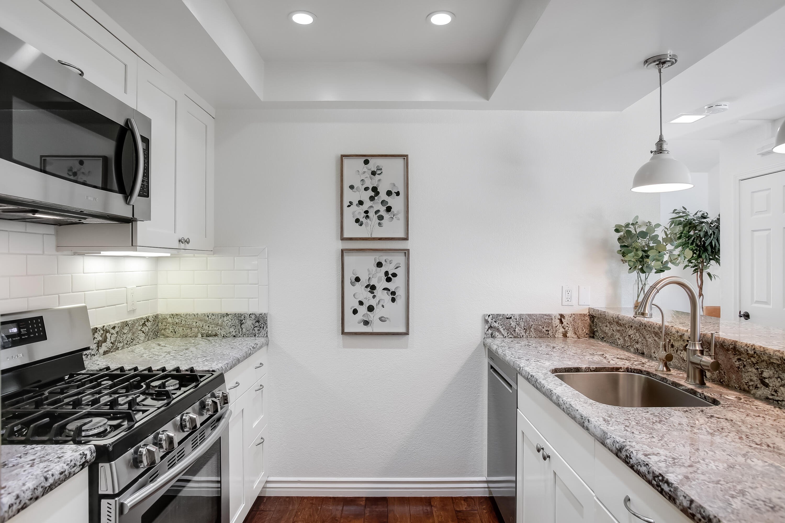 5341 Traci Drive Santa Barbara, CA 93111 - Photo 8 of 23 a kitchen with stainless steel appliances granite countertop a sink stove and microwave