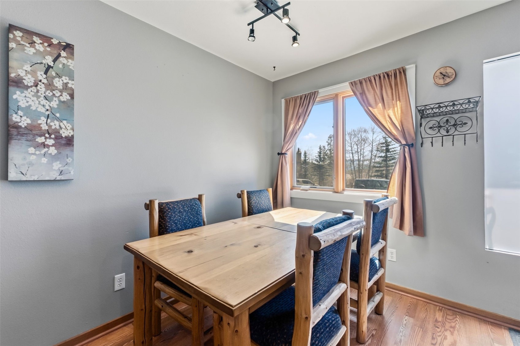 6734 Ryan Gulch Road, Unit 6734 Silverthorne, CO 80498 - Photo 14 of 33 a view of a dining room with furniture window and outside view