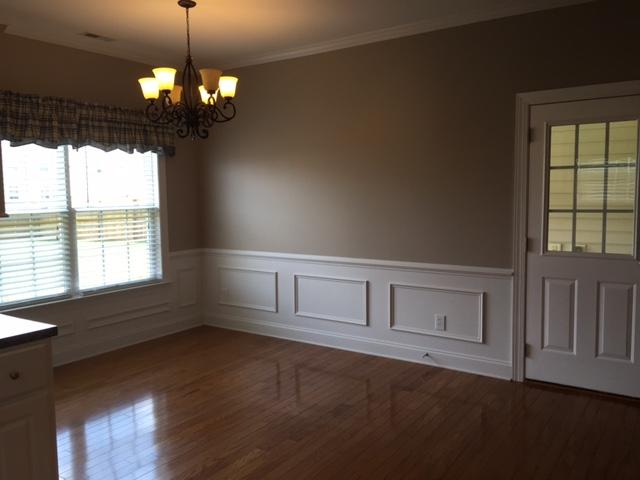 7696 Eagle Lake Road North Charleston, SC 29418 - Photo 12 of 36 Kitchen Dining with door leading to Scre