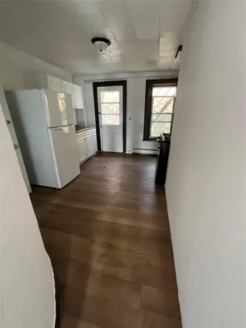 a view of livingroom with hardwood floor and window