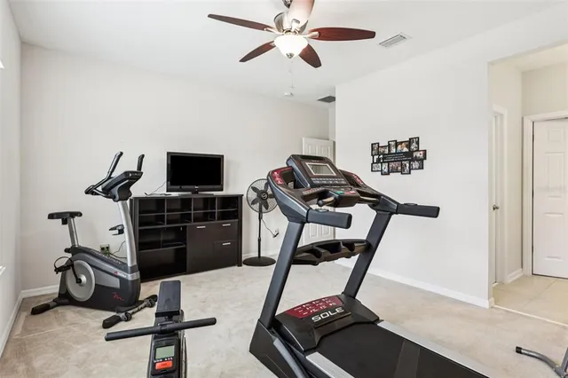 a bathroom with a sink vanity and a mirror