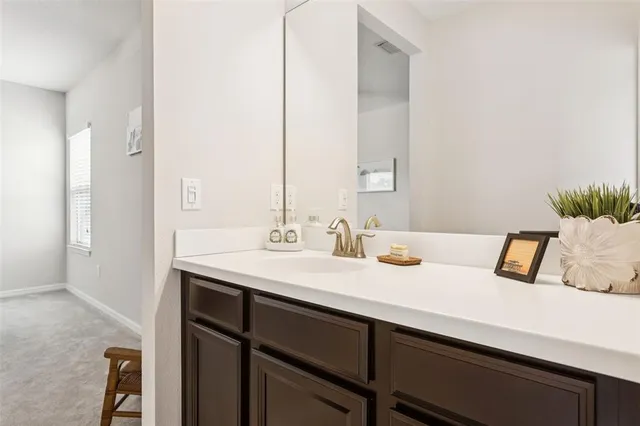 a room with gym equipment and a large window