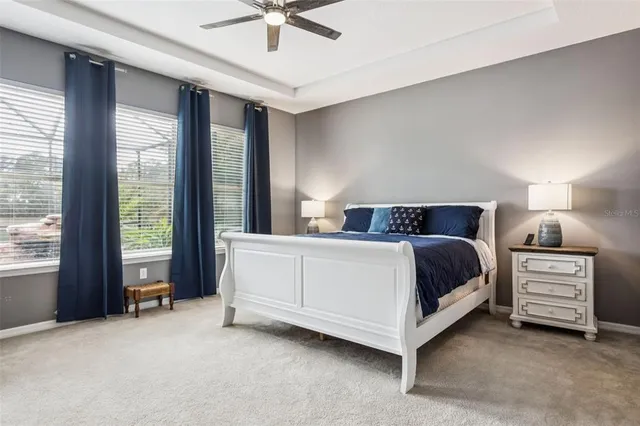a view of a living room and floor to ceiling window