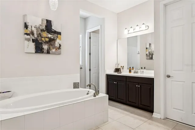 a blue bench sitting in front of a building