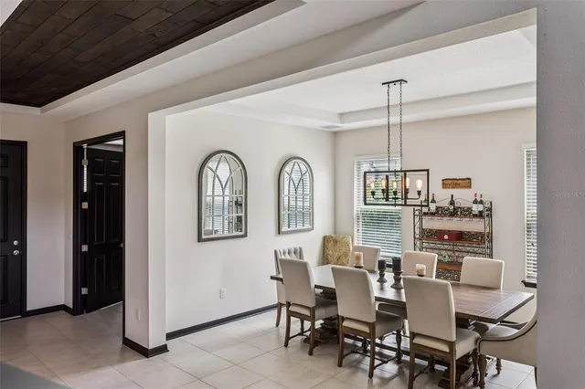 a kitchen with granite countertop a sink and a stove top oven