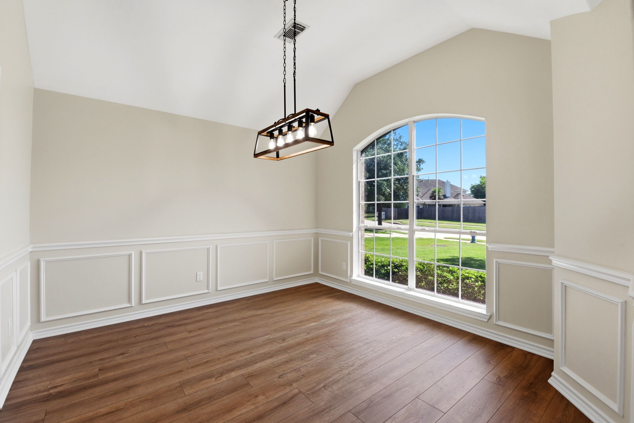 29819 South Legends Village Circle Spring, TX 77386 - Photo 20 of 48 a view of an empty room with a window and wooden floor