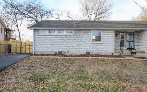 a front view of house with yard