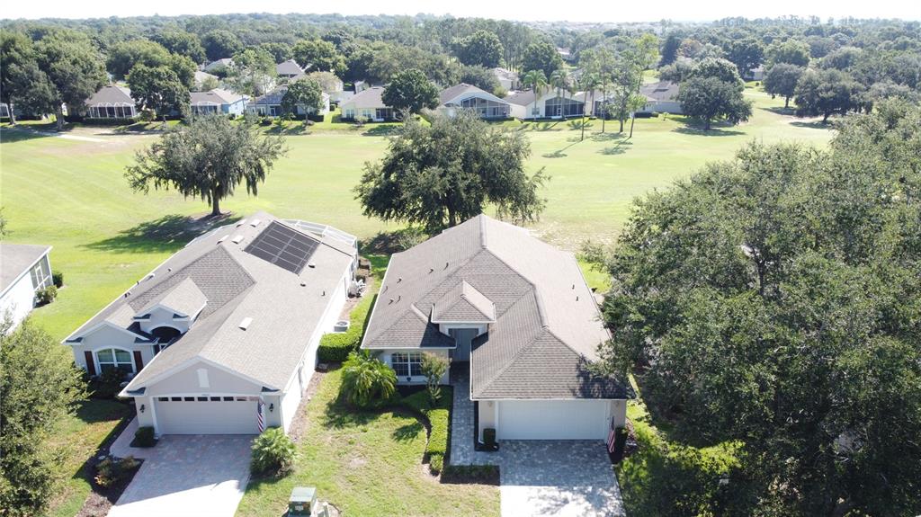 2292 Edmonton Court Clermont, FL 34711 - Photo 3 of 76 an aerial view of residential houses with outdoor space and river