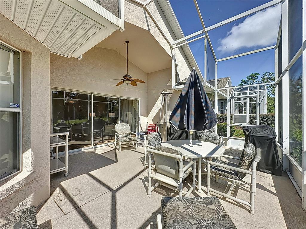 2292 Edmonton Court Clermont, FL 34711 - Photo 35 of 76 a view of a chairs and table in a patio