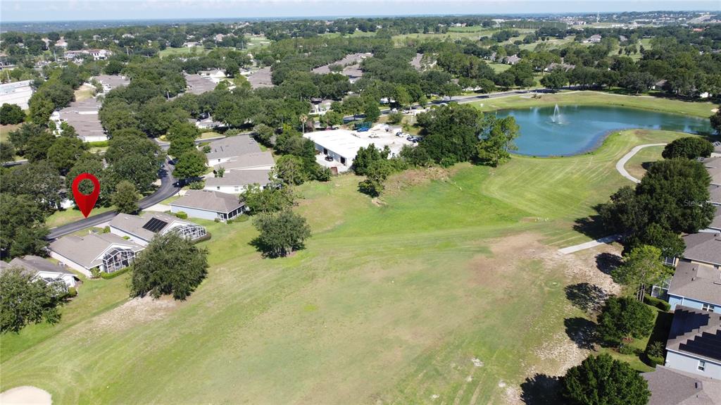 2292 Edmonton Court Clermont, FL 34711 - Photo 4 of 76 an aerial view of residential houses with outdoor space and lake view