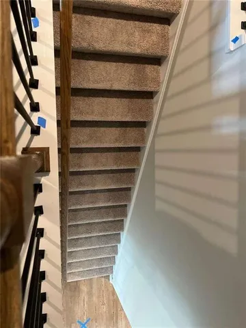 a view of entryway with wooden floor