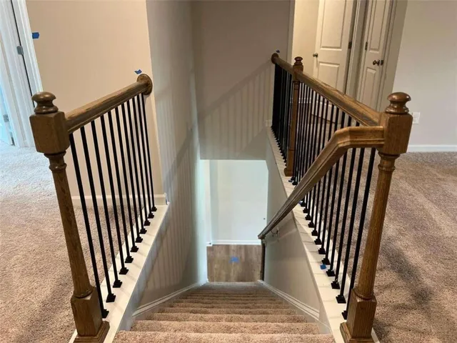 an entryway with a staircase