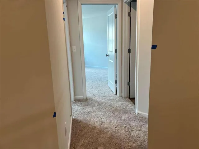 a view of a room with a hallway