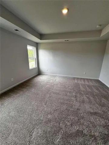 an empty room with a empty shelves