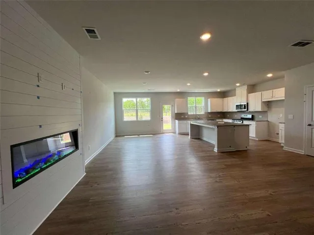 a view of a kitchen with a sink and a stove