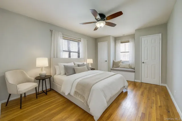 a bedroom with a bed and a chair