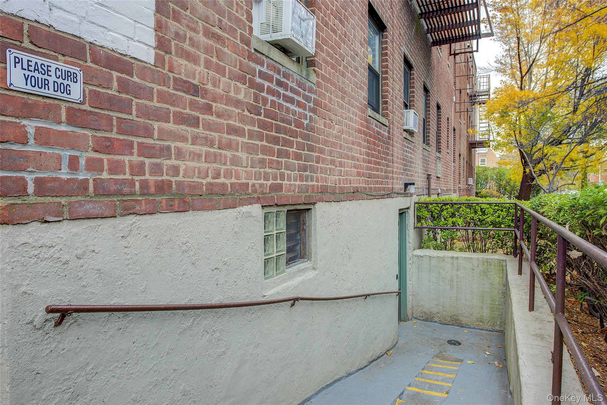 46-42 215th Place, Unit 1C Queens, NY 11361 - Photo 21 of 28 a view of outdoor space