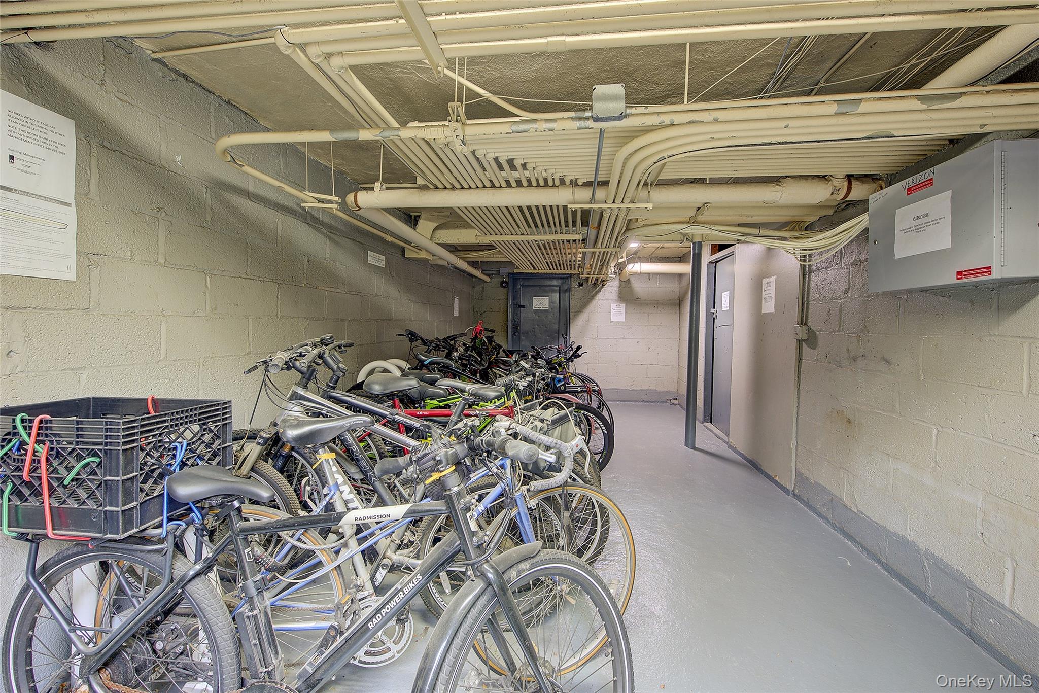 46-42 215th Place, Unit 1C Queens, NY 11361 - Photo 23 of 28 a view of a room with gym equipment