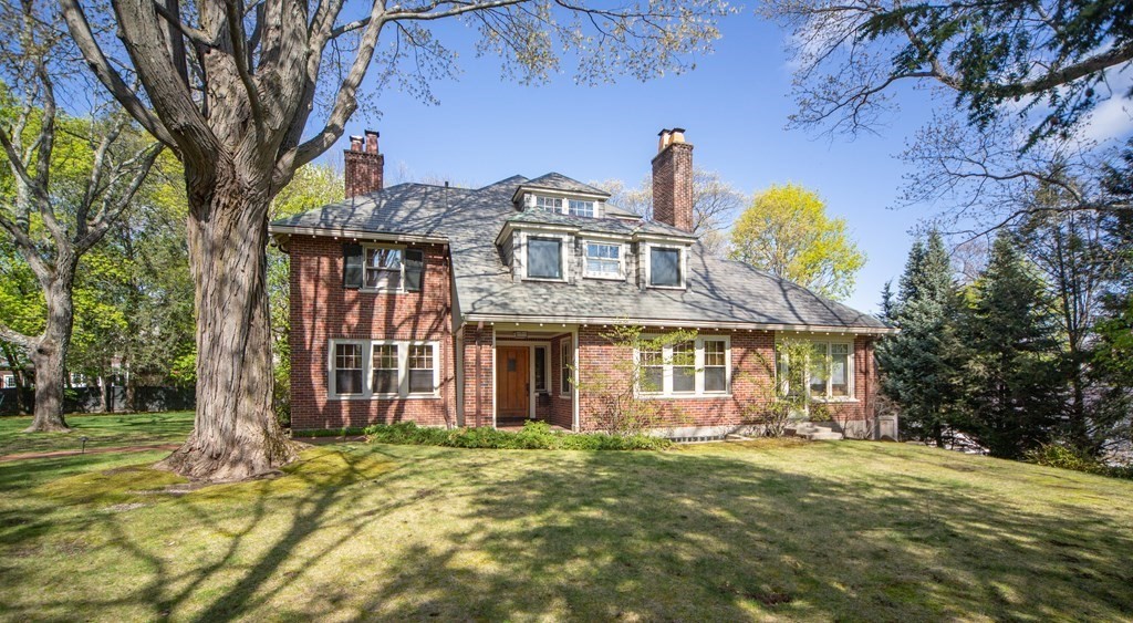 27 Metacomet Road Newton, MA 02468 - Photo 19 of 22 a front view of a house with a garden
