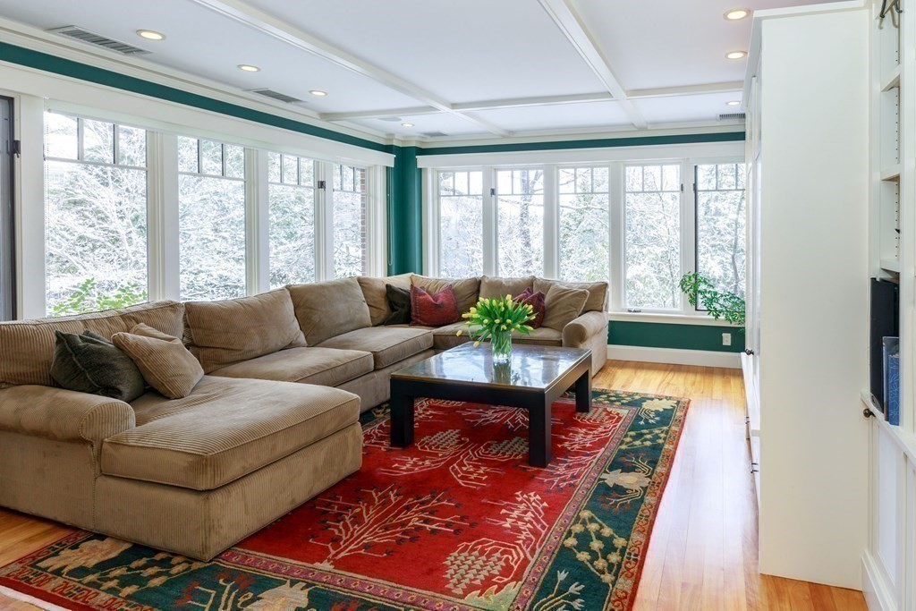 27 Metacomet Road Newton, MA 02468 - Photo 5 of 22 a living room with furniture and a flat screen tv