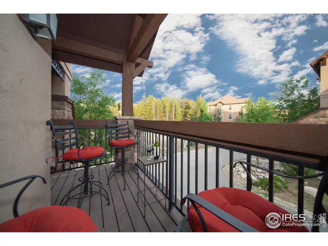 a view of balcony with furniture