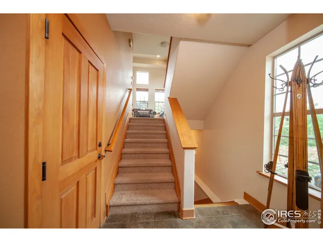 a view of an entryway with staircase