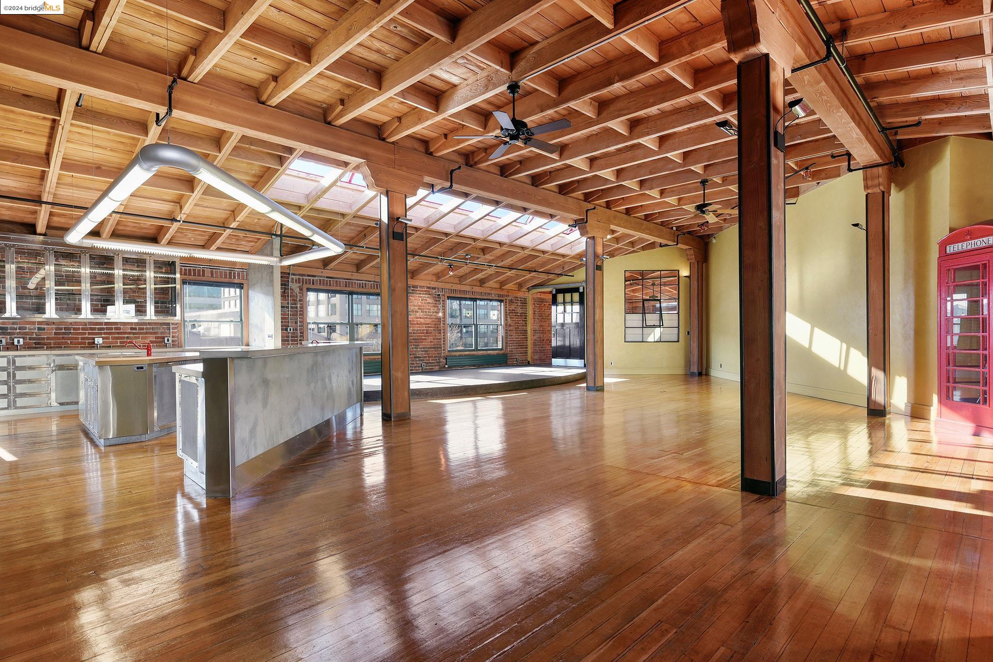 299 3rd Street Oakland, CA 94607 - Photo 1 of 1 a view of a building with wooden floor