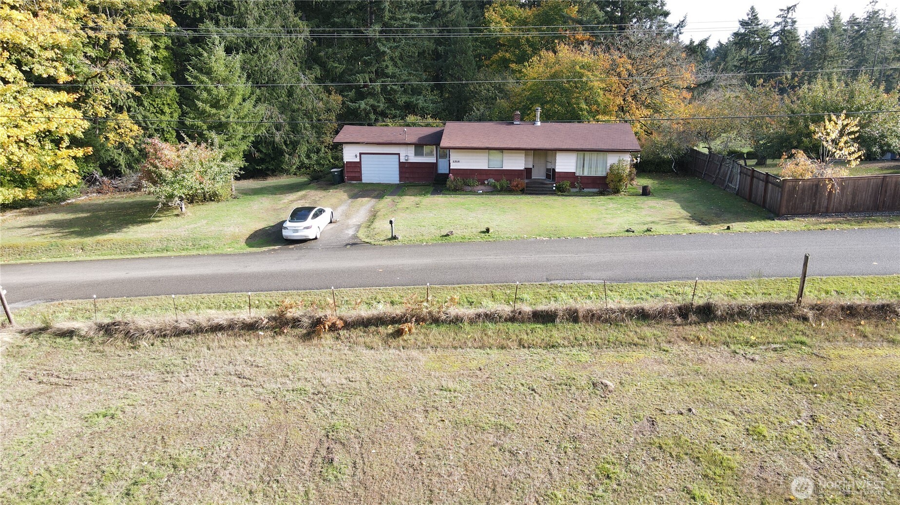 1216 Kaiser Road Southwest Olympia, WA 98512 - Photo 30 of 31 a view of a house with a yard