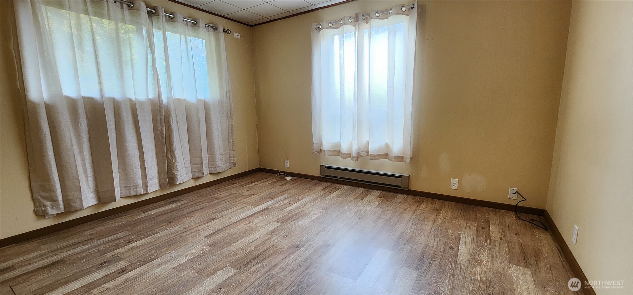 1216 Kaiser Road Southwest Olympia, WA 98512 - Photo 8 of 31 a view of wooden floor and brick walls