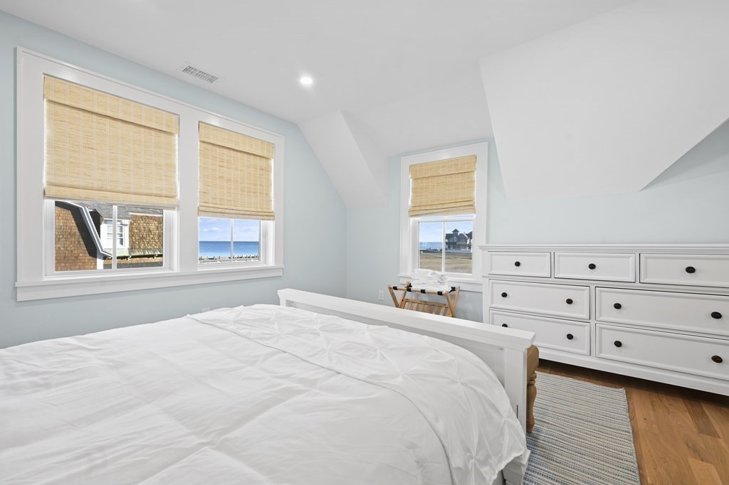 9 Tuckernuck Avenue Oak Bluffs, MA 02557 - Photo 12 of 30 a bedroom with a bed and a window
