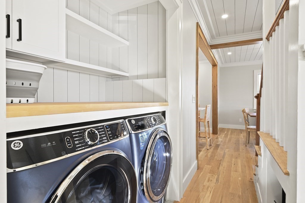 9 Tuckernuck Avenue Oak Bluffs, MA 02557 - Photo 25 of 30 a view of washer and dryer with kitchen in the background