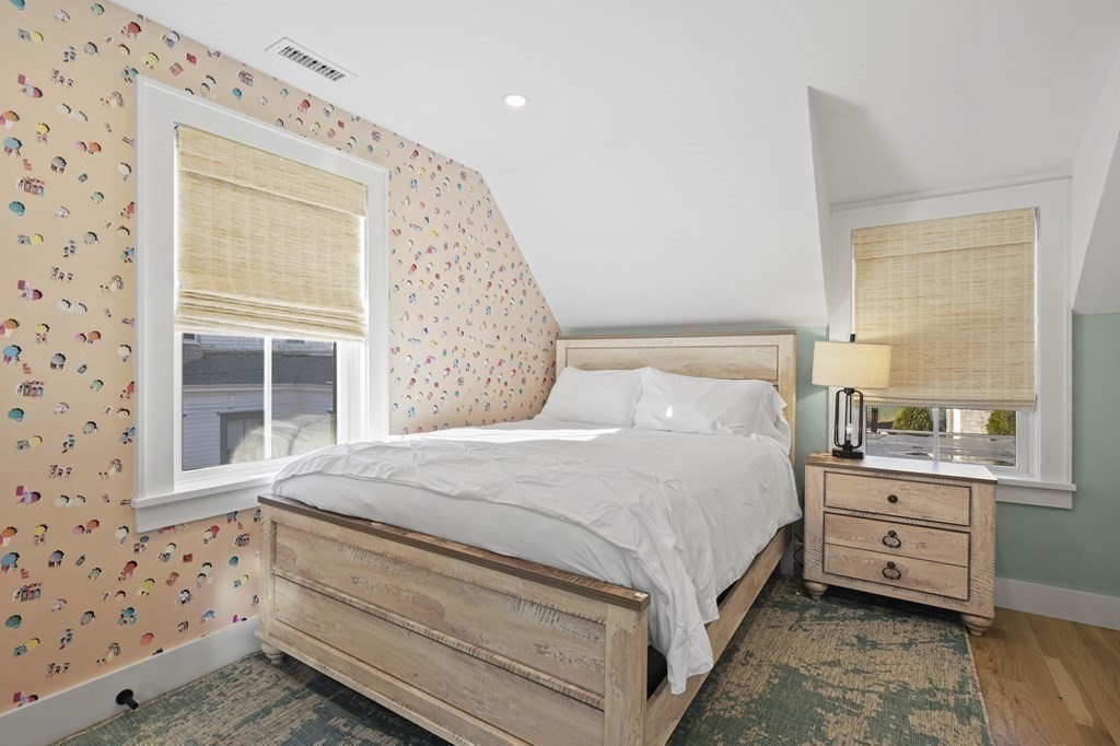 9 Tuckernuck Avenue Oak Bluffs, MA 02557 - Photo 28 of 30 a bedroom with a bed and a window